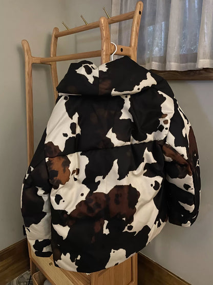 oversized black and white cow print coat