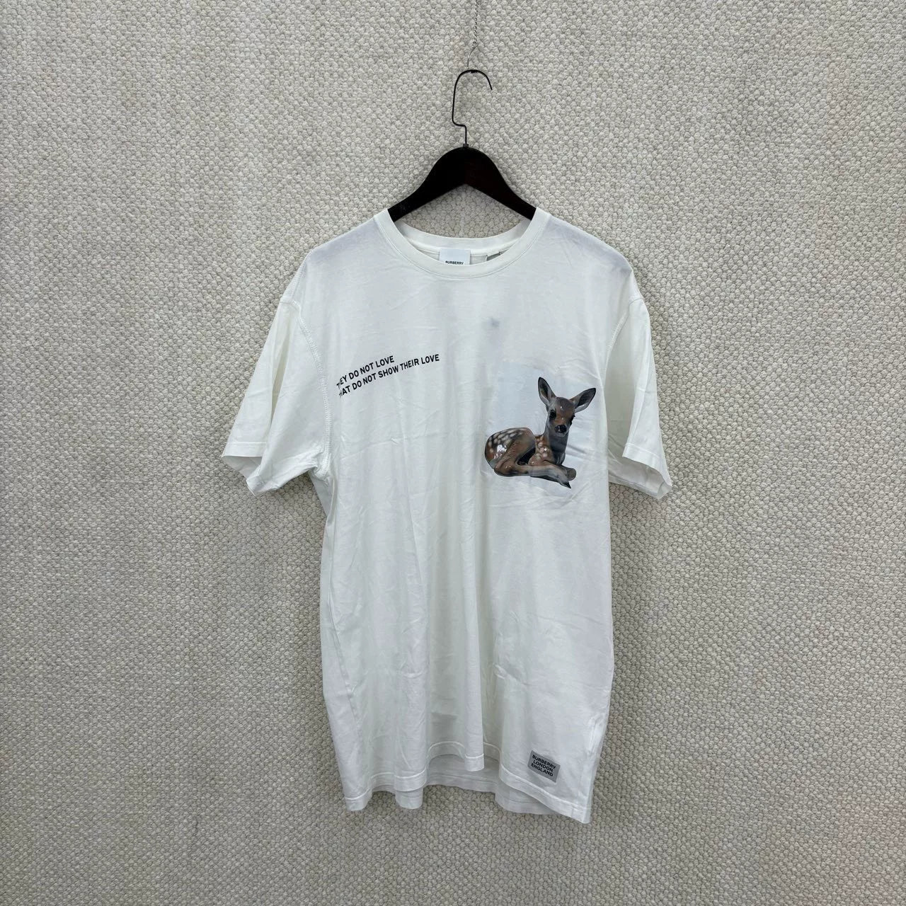 white graphic t-shirt with deer print