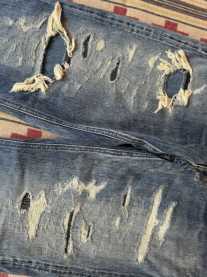 fdmtl slim fit denim distressed jeans