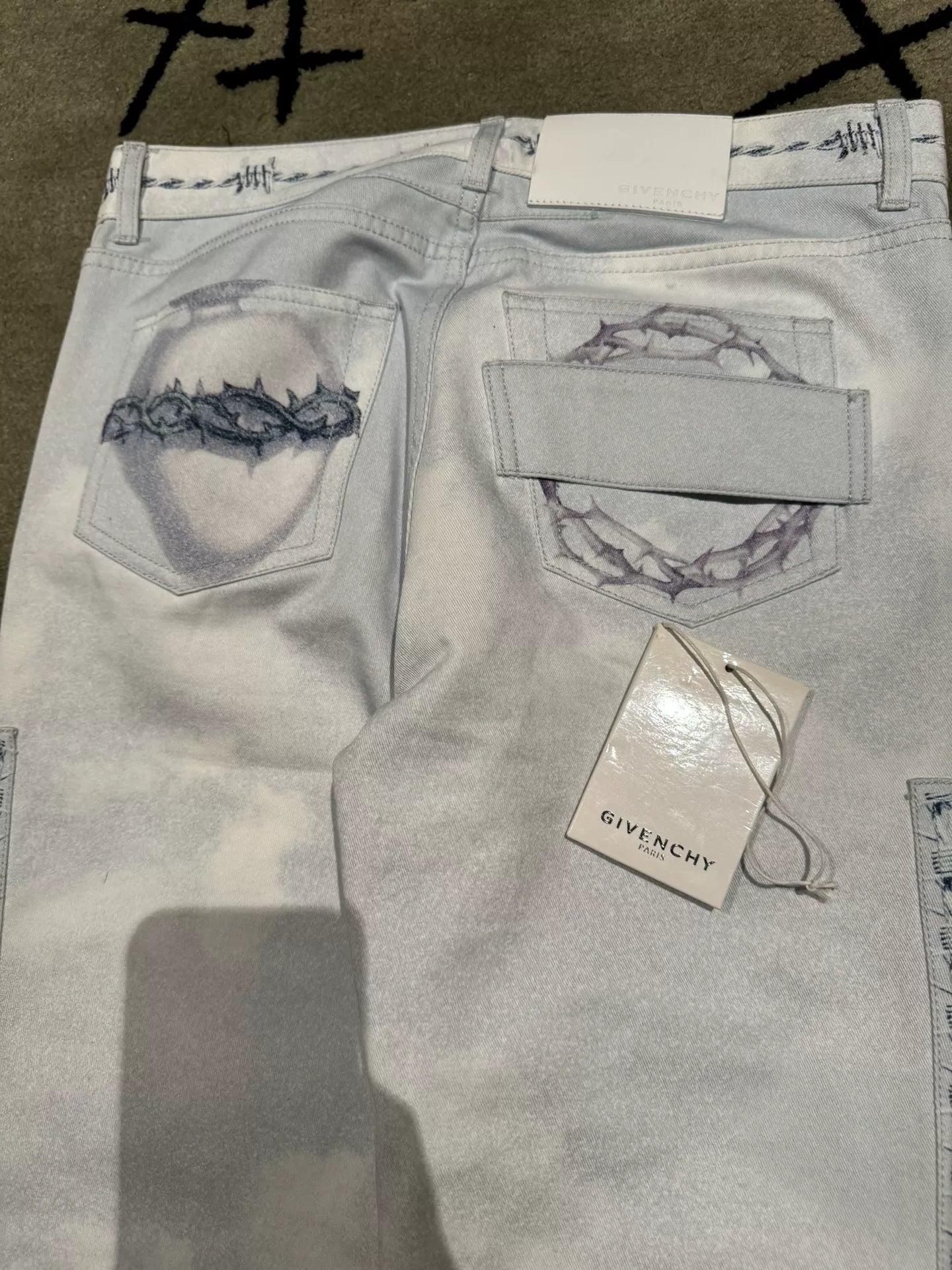 givenchy paris jesus print denim pants