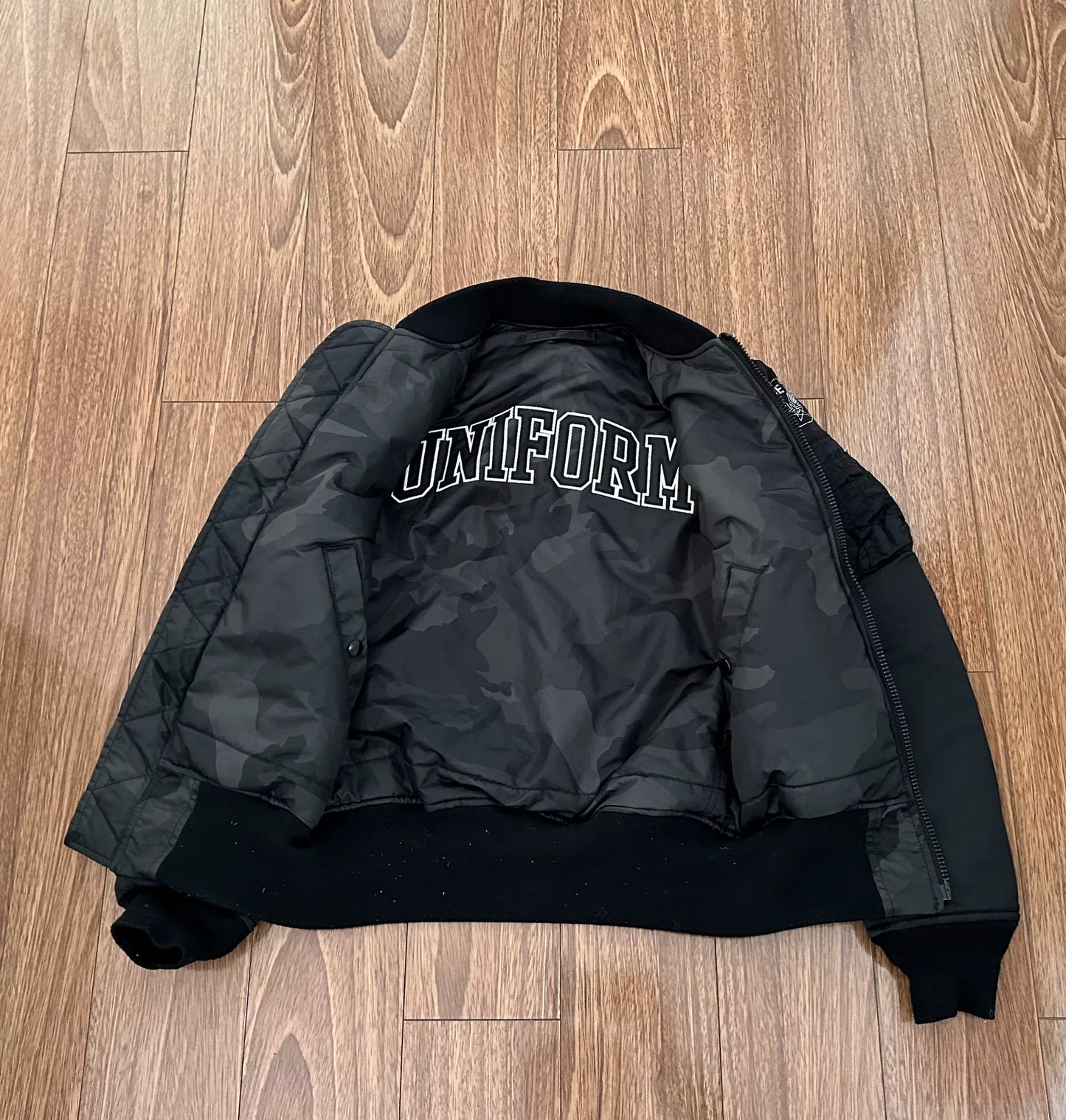 black reversible MA-1 bomber jacket