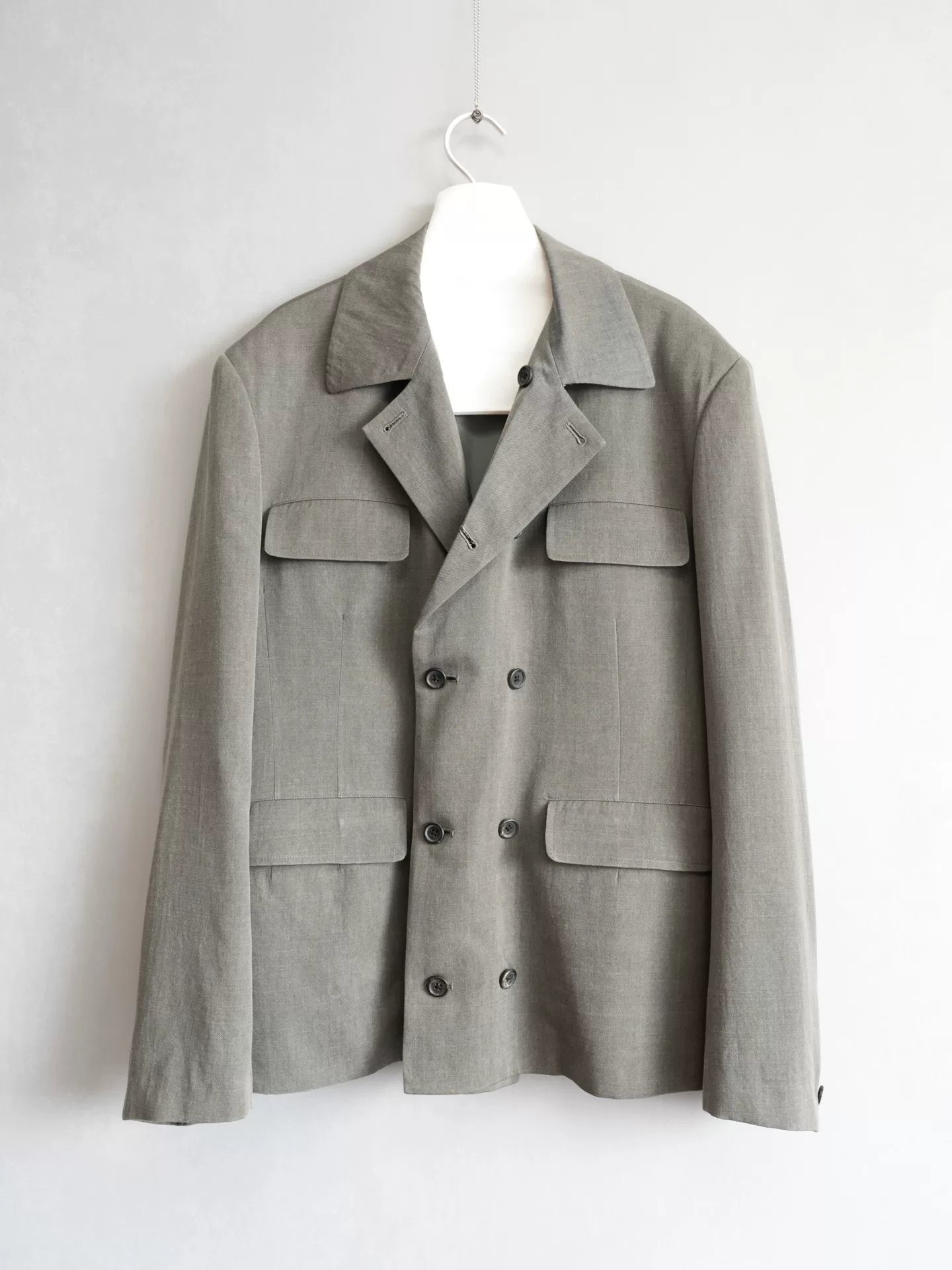 double-breasted concrete gray jacket