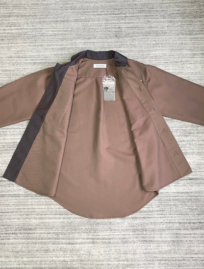 brown patchwork jacket by Kiko Kostadinov