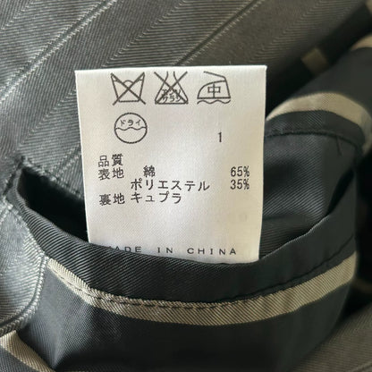 gray striped suit by Jean Paul Gaultier