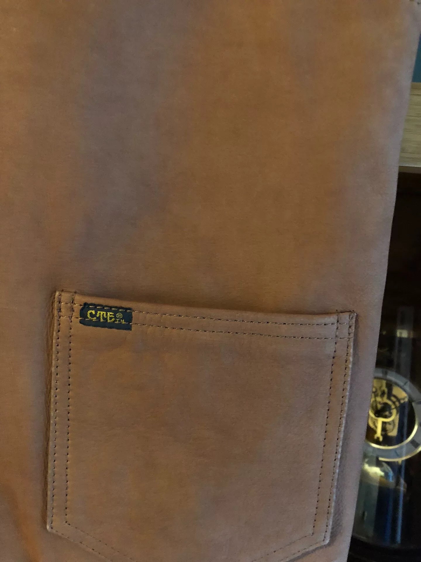 cootie leather utility vest in golden brown