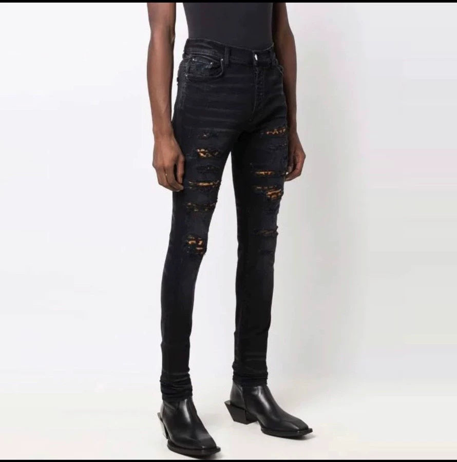 amiri leopard thrasher jean in size 34