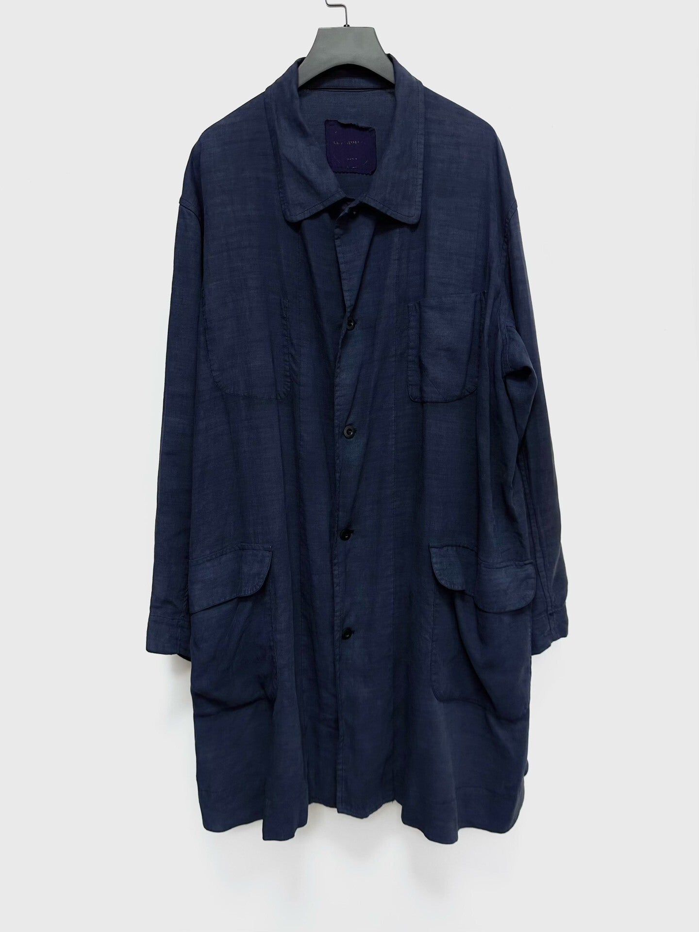 blue dyed linen coat by VIDALENC