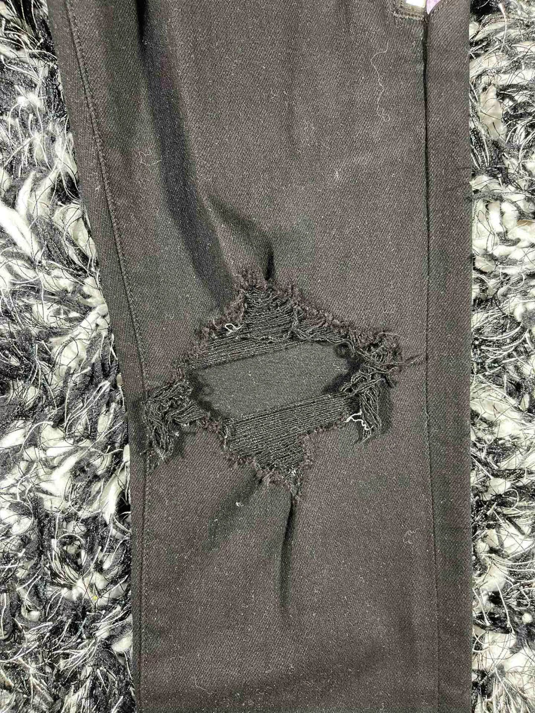 amiri watercolor half track jean