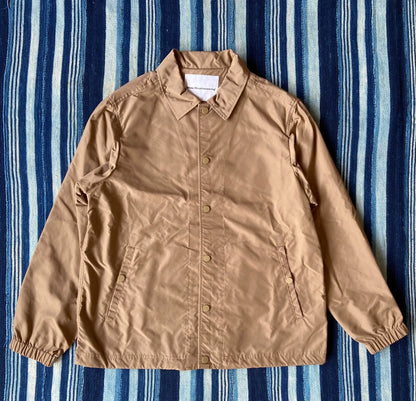 white mountaineering printed jacket