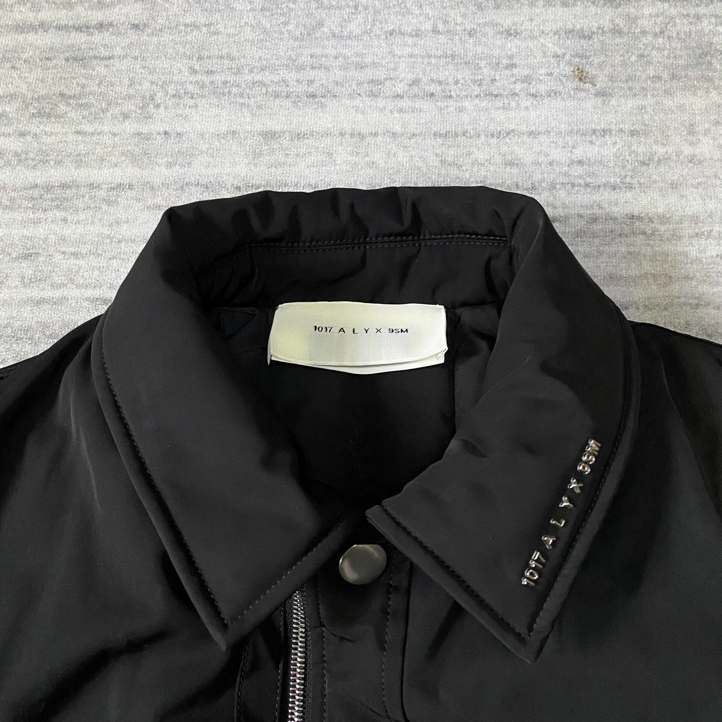 black bomber jacket with hidden pockets