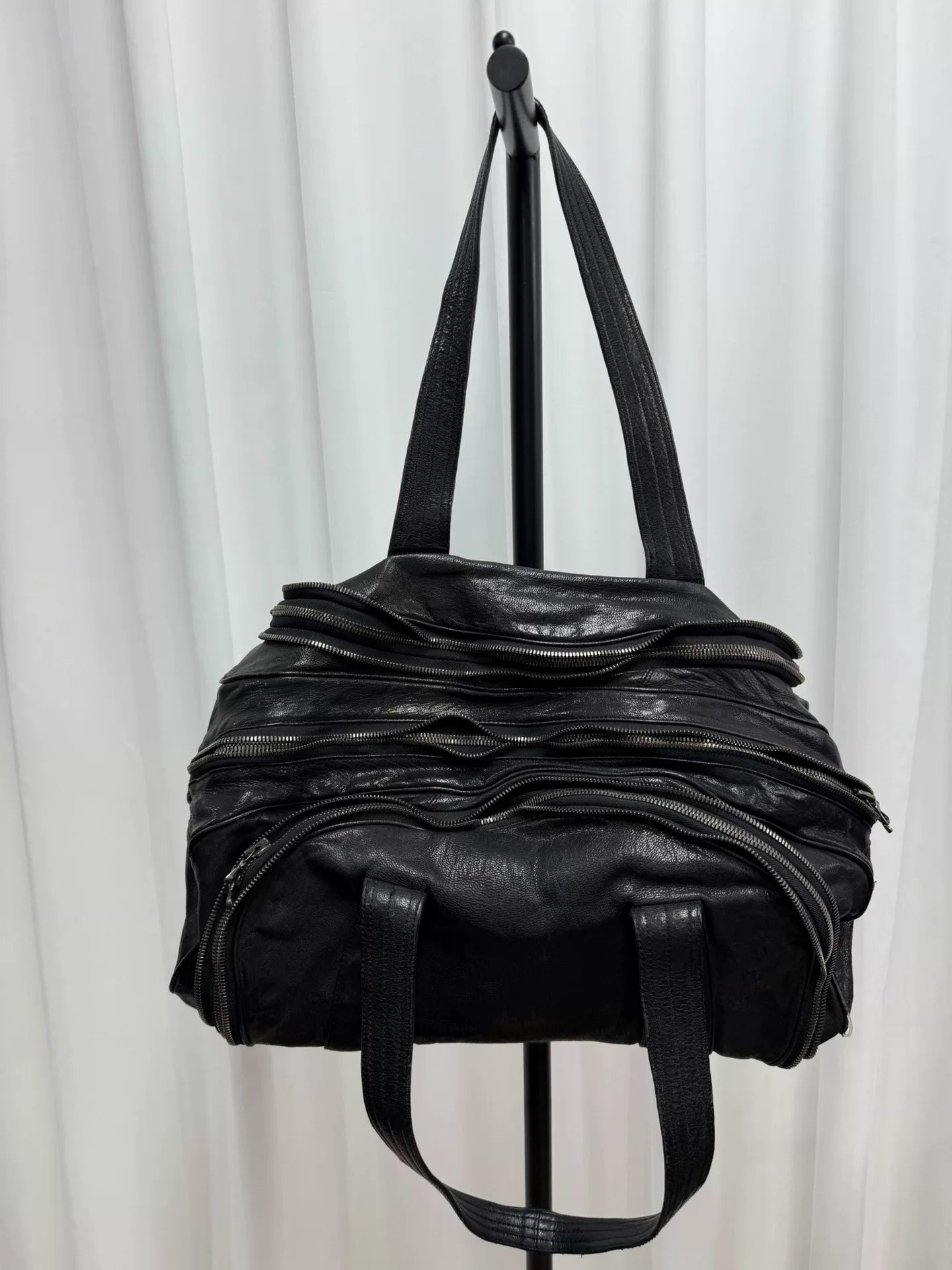 large black zippered handbag