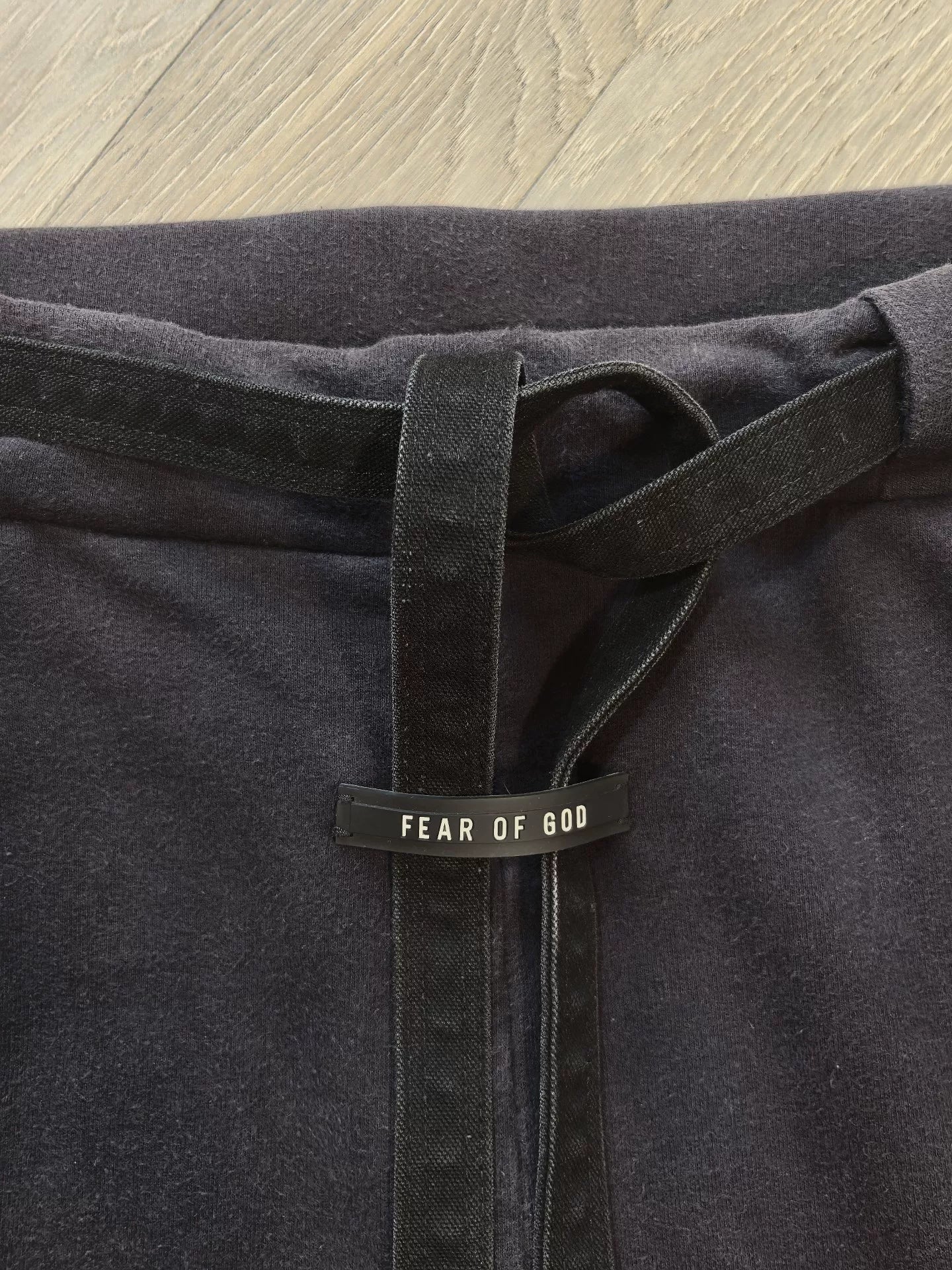 fear of god distressed shorts with belt