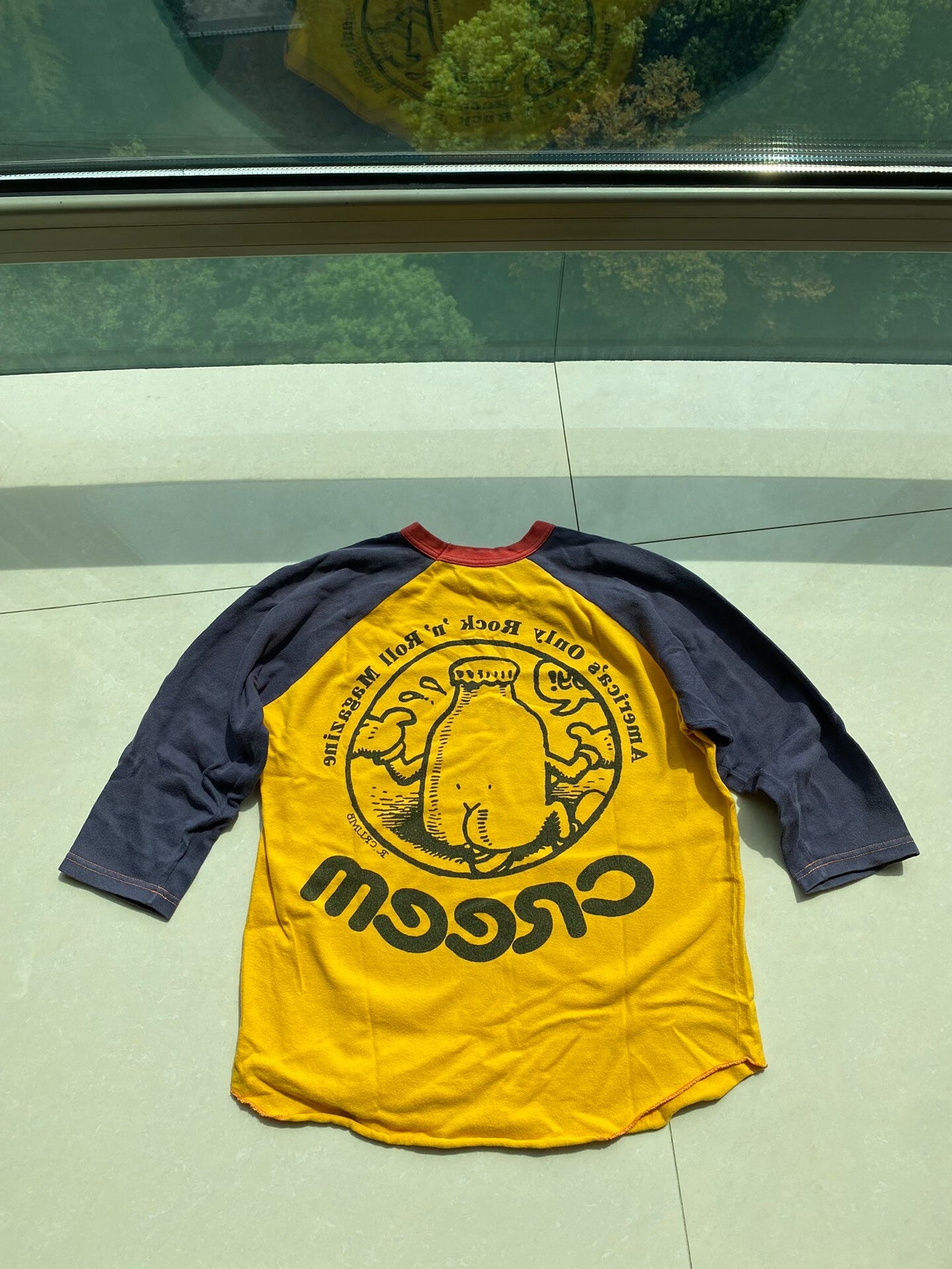 yellow blue graphic tee with 3/4 sleeves