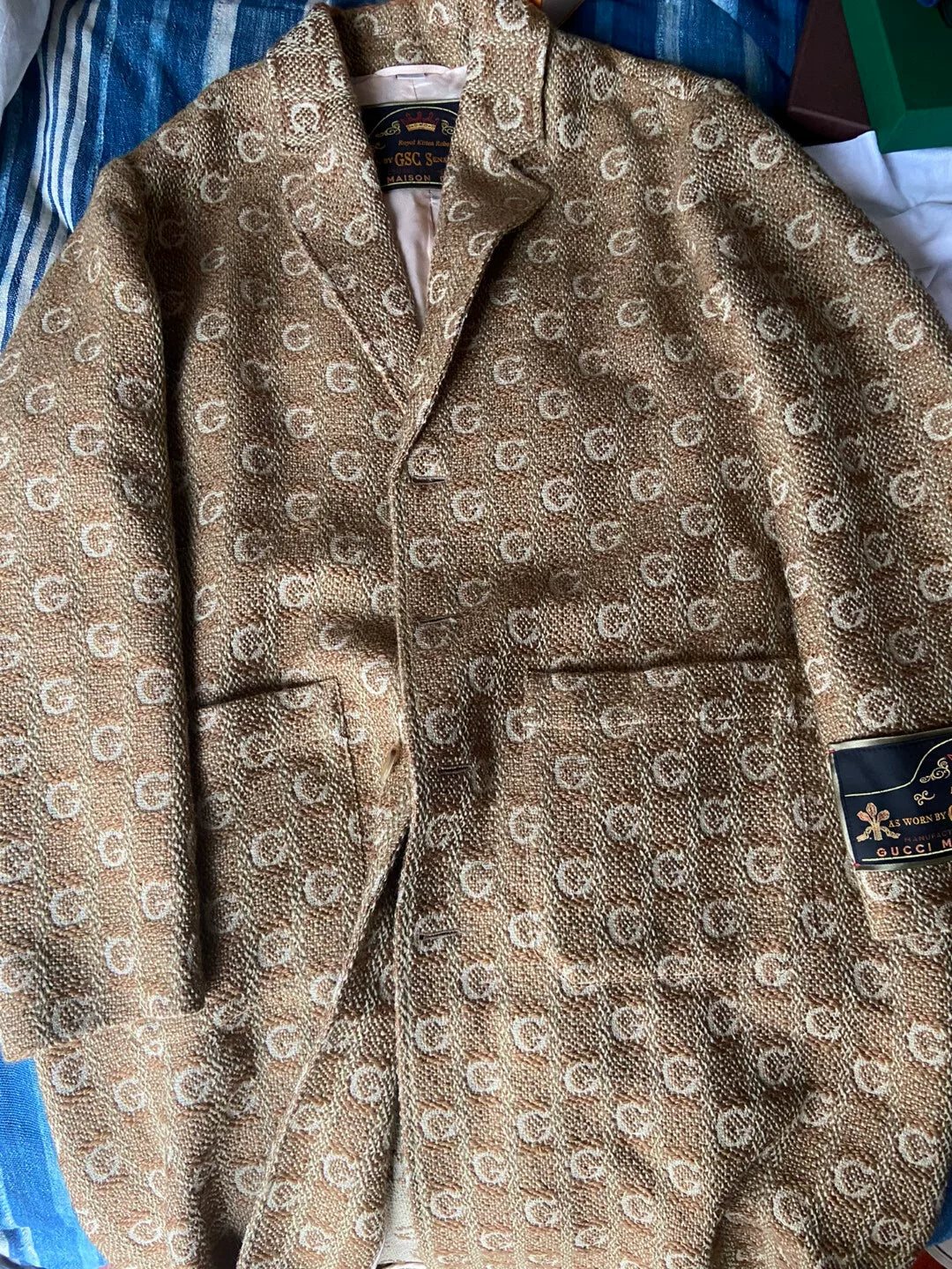 gucci logo embroidered trench coat