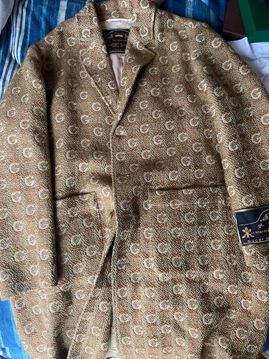gucci logo embroidered trench coat