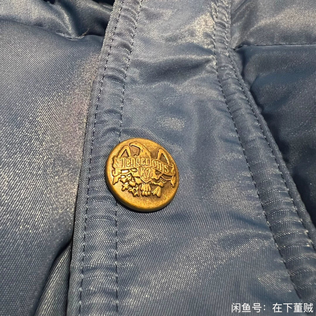 blue down vest by Tenderloin Tokyo