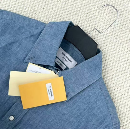 thom browne light blue striped button-up shirt