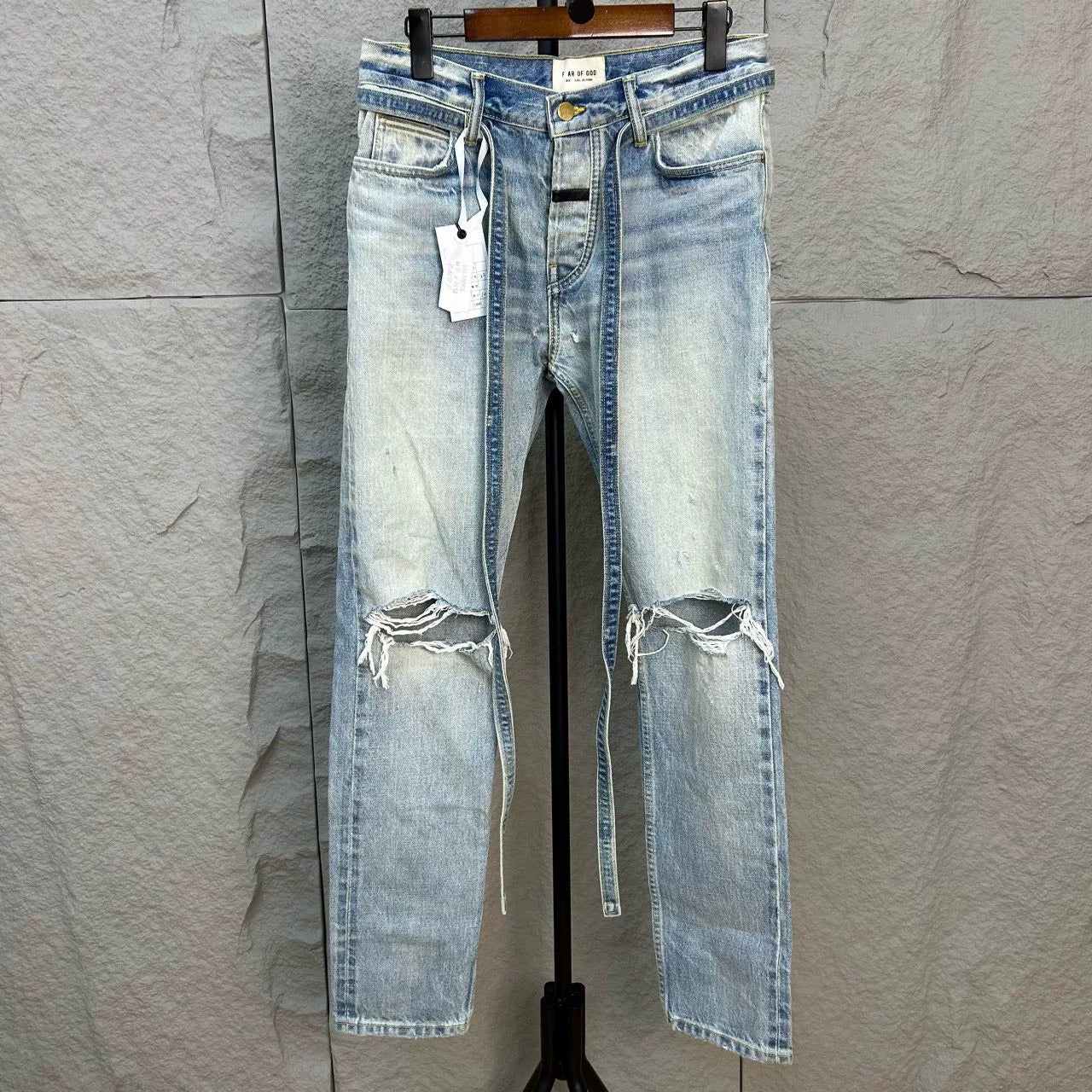 fear of god distressed washed denim pants