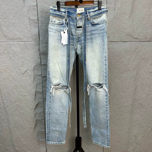 fear of god distressed washed denim pants