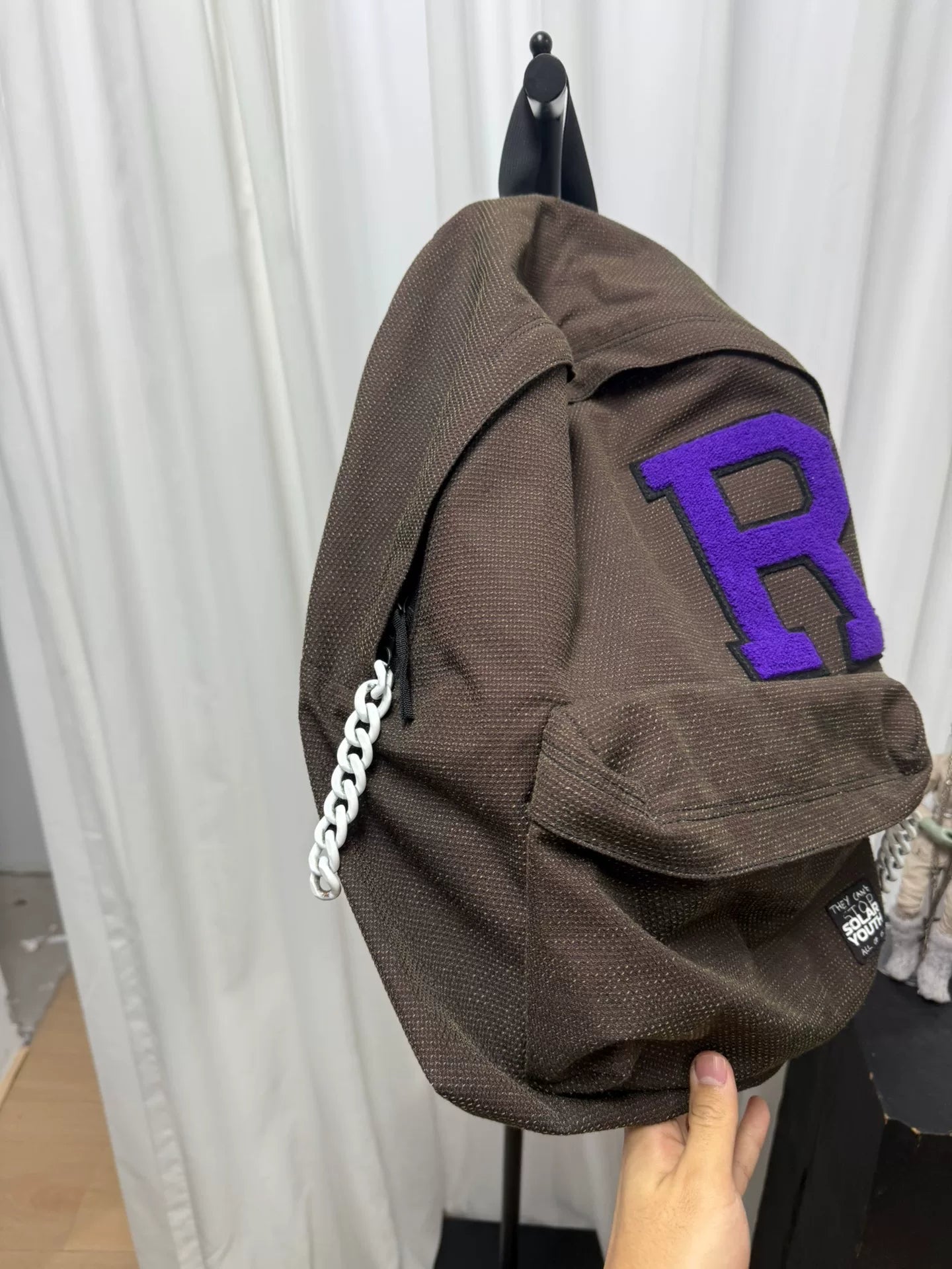 raf simons plush chain backpack in brown