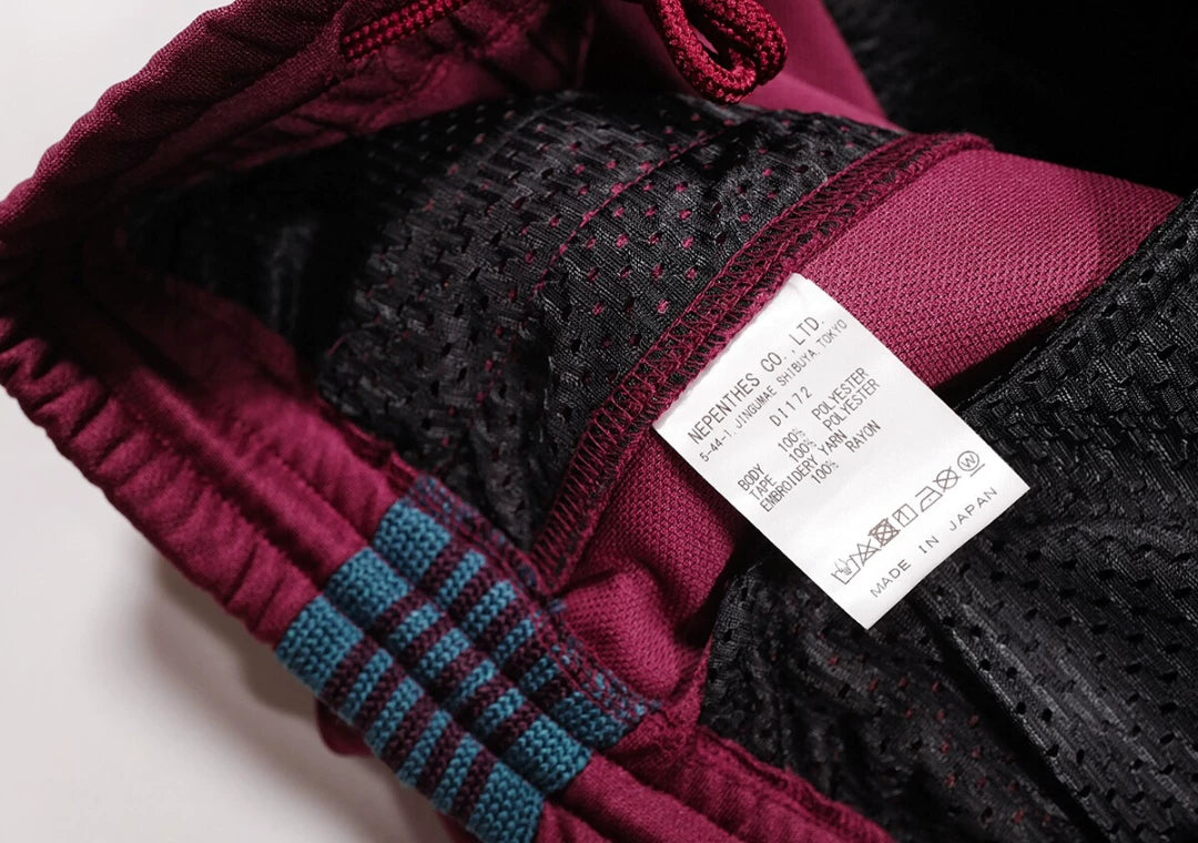 Needles Track Pant in Burgundy with Embroidery