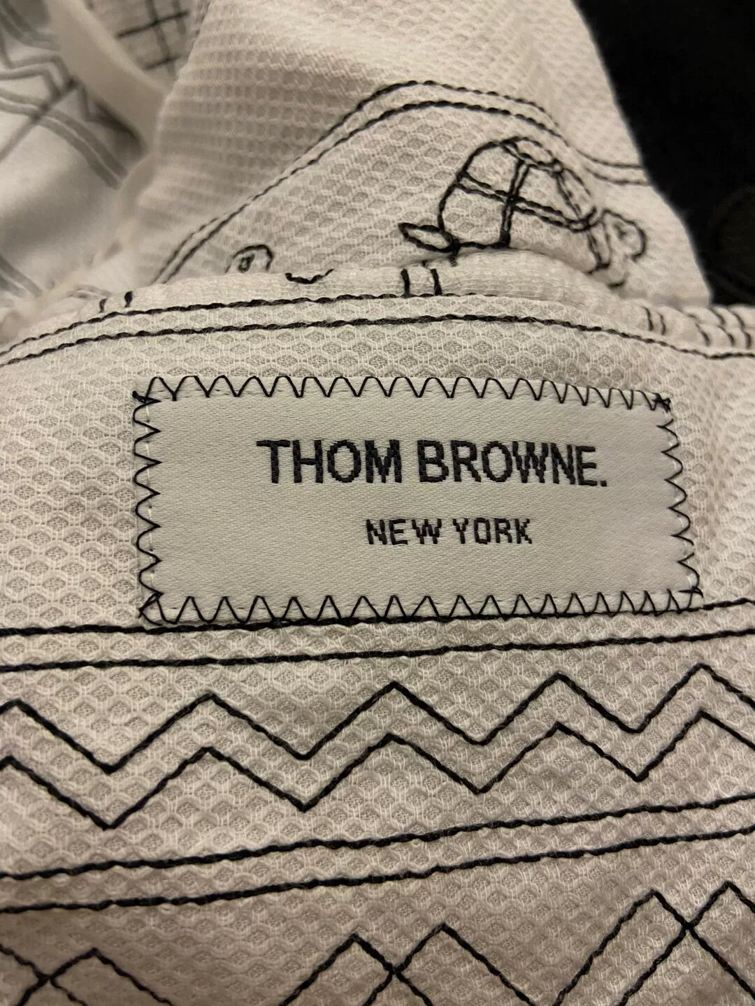 thom browne embroidered black coat with details