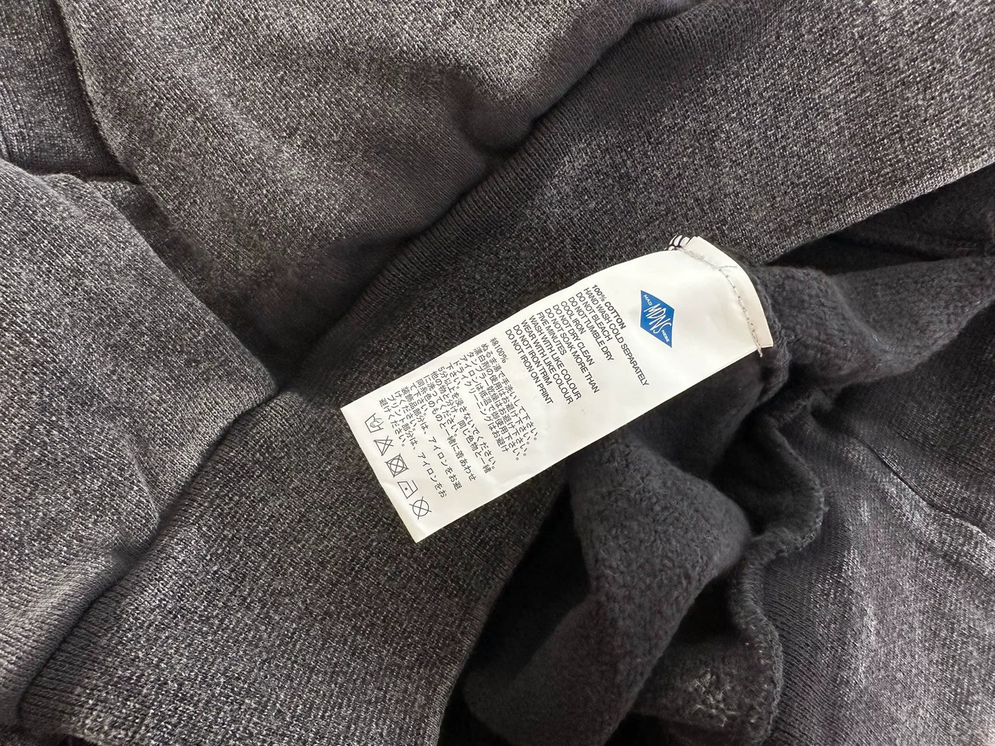 madness washed print sweater in black