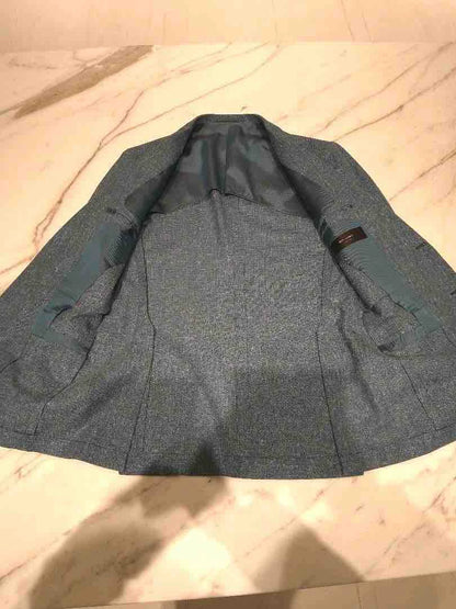 custom hand-tailored jacket in turquoise blue