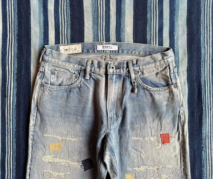 fdmtl slim fit denim distressed patchwork jeans