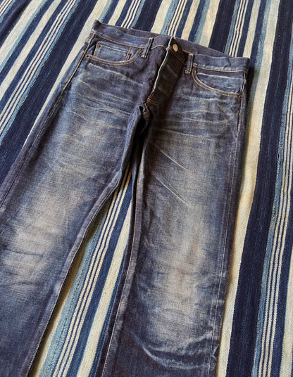 washed vintage-style raw denim jeans