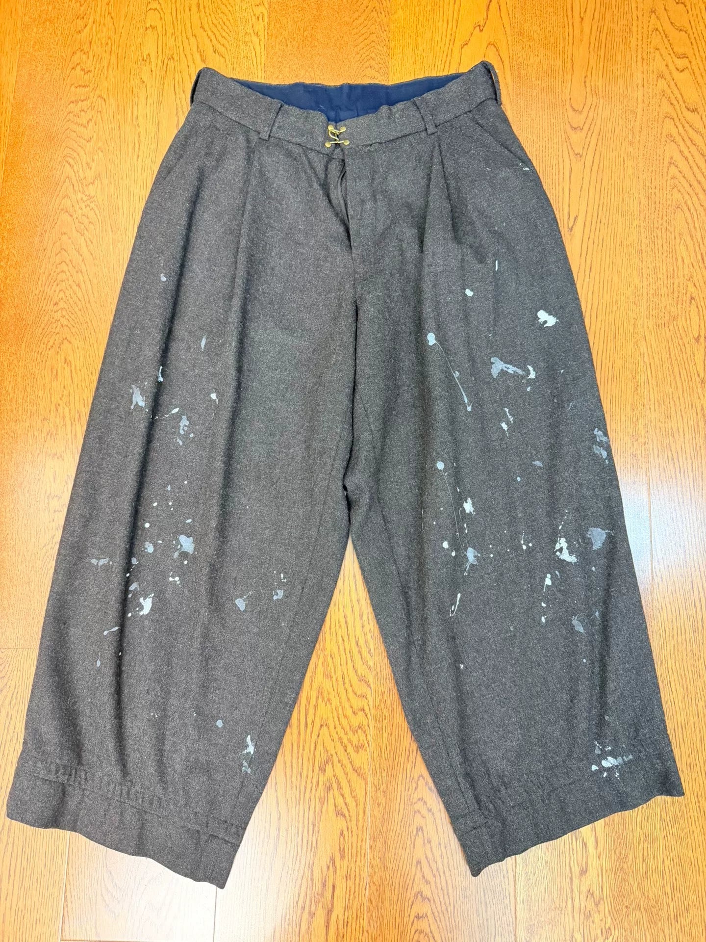 kolor black wool pants with paint splatter