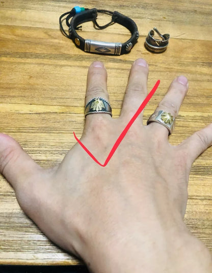 goros eagle ring with silver and gold details