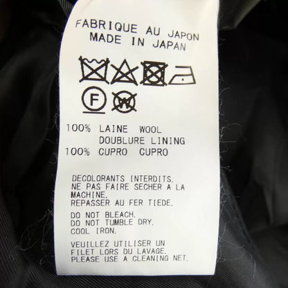 asymmetrical coat by yohji yamamoto