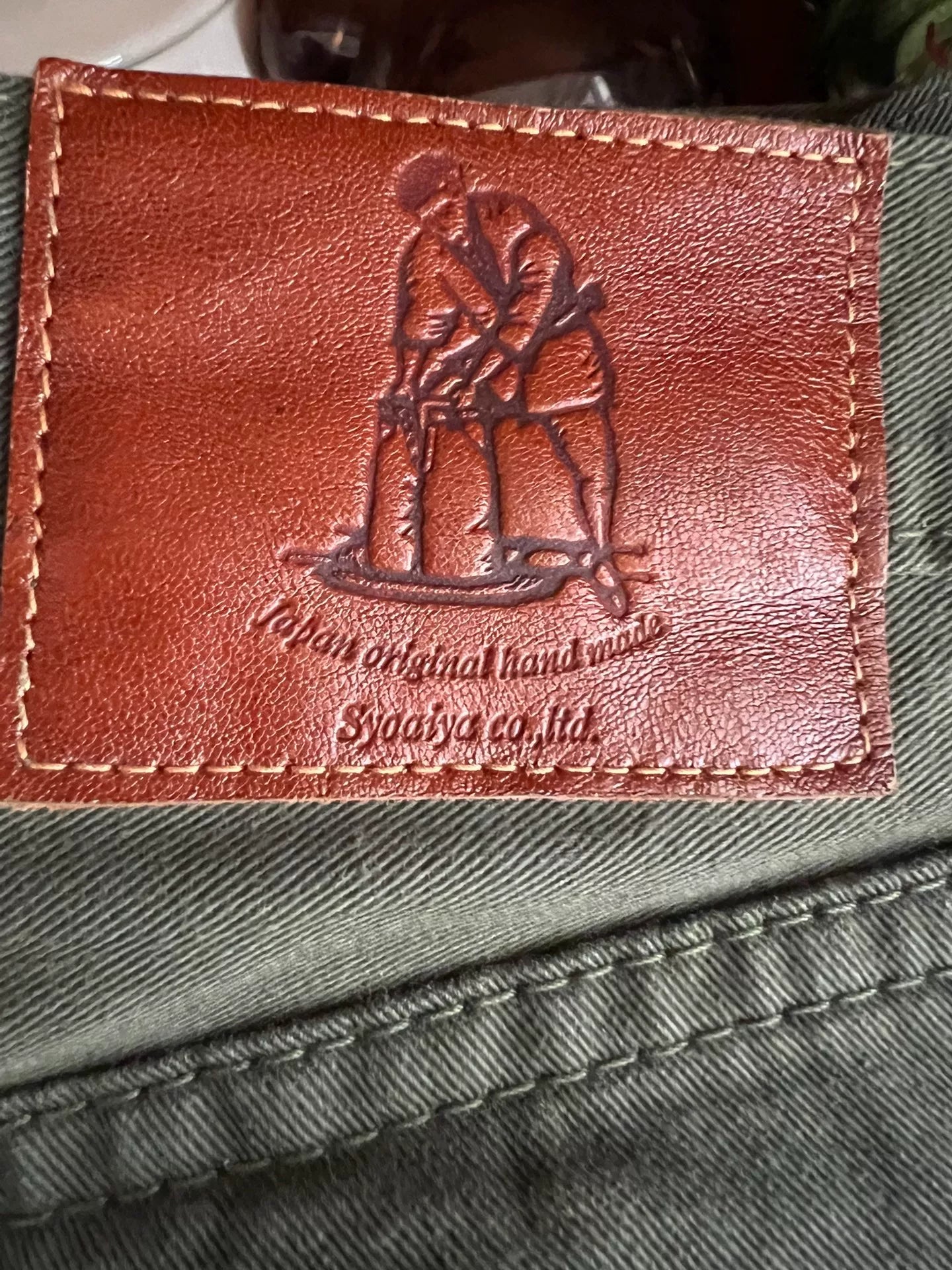 military green denim pants from Pure Blue Japan