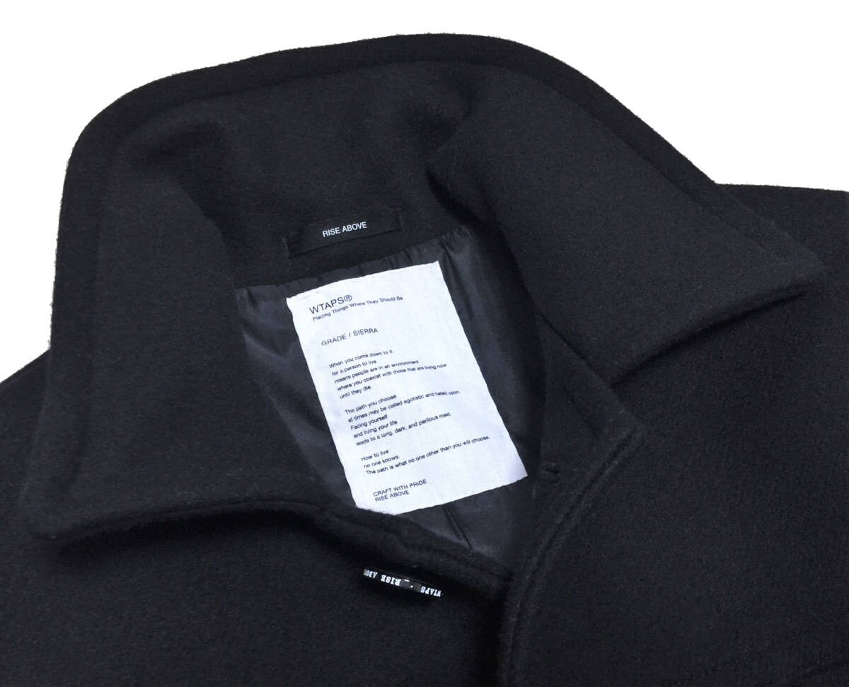 black wool watch coat with single button