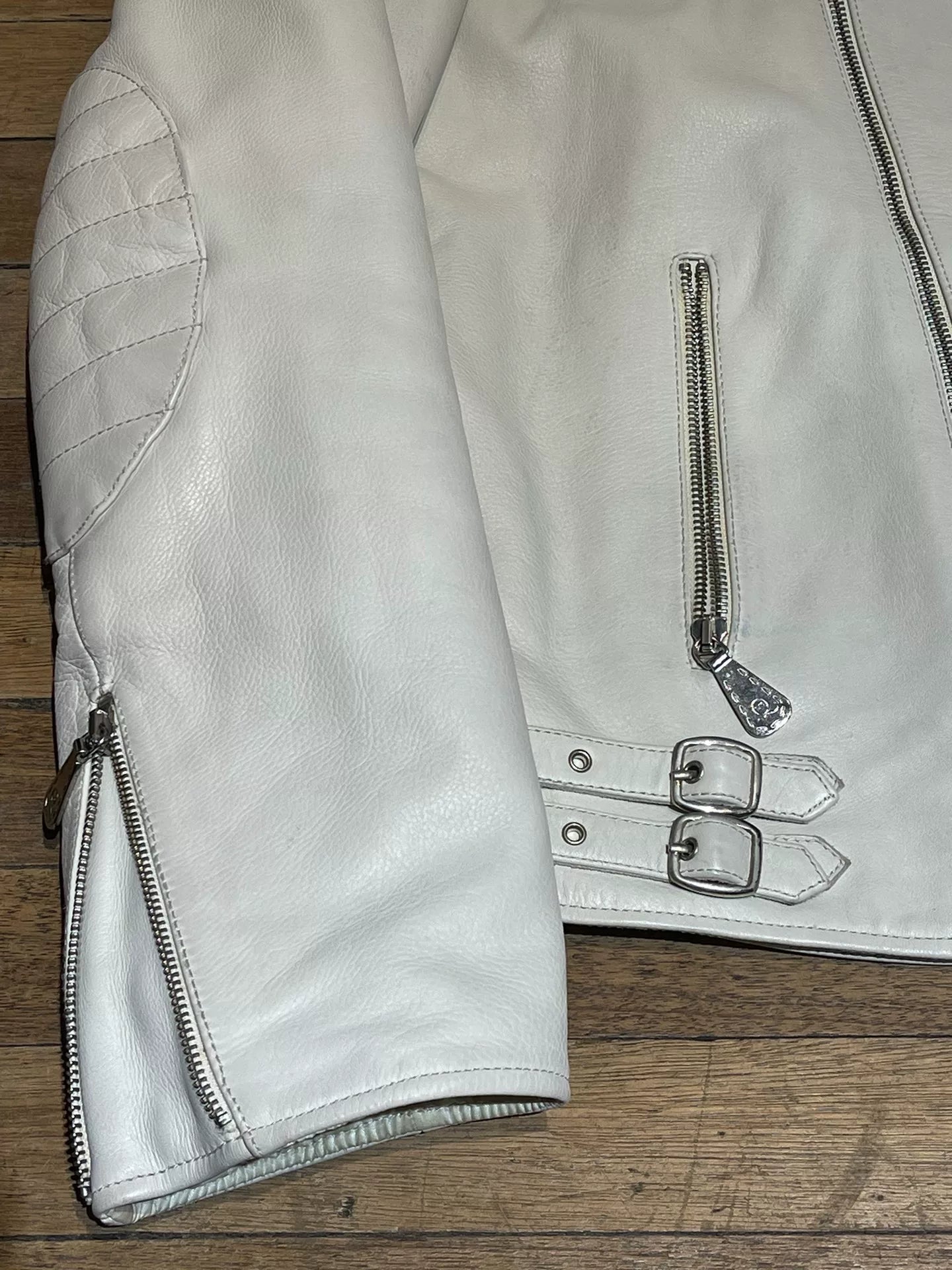 white leather motorcycle jacket by Alexander McQueen