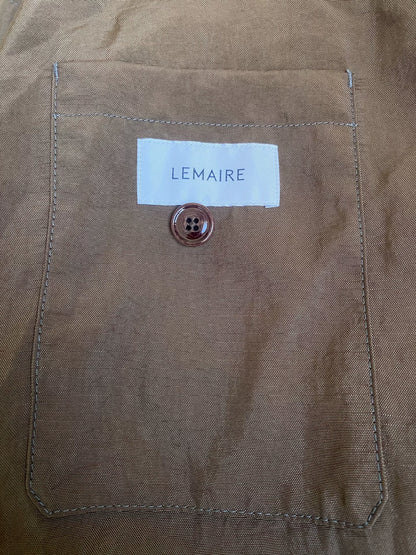 brown belted trench coat with military silhouette