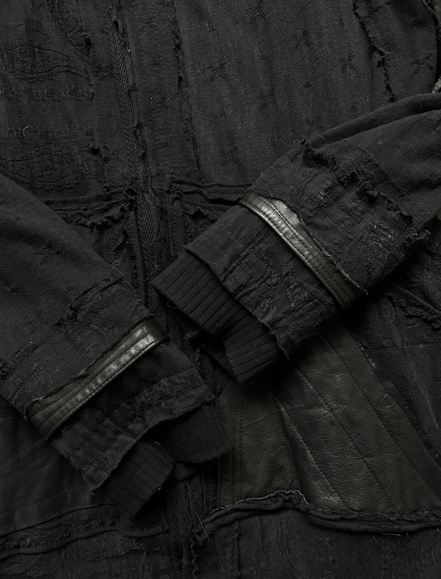 black patchwork hooded outerwear jacket