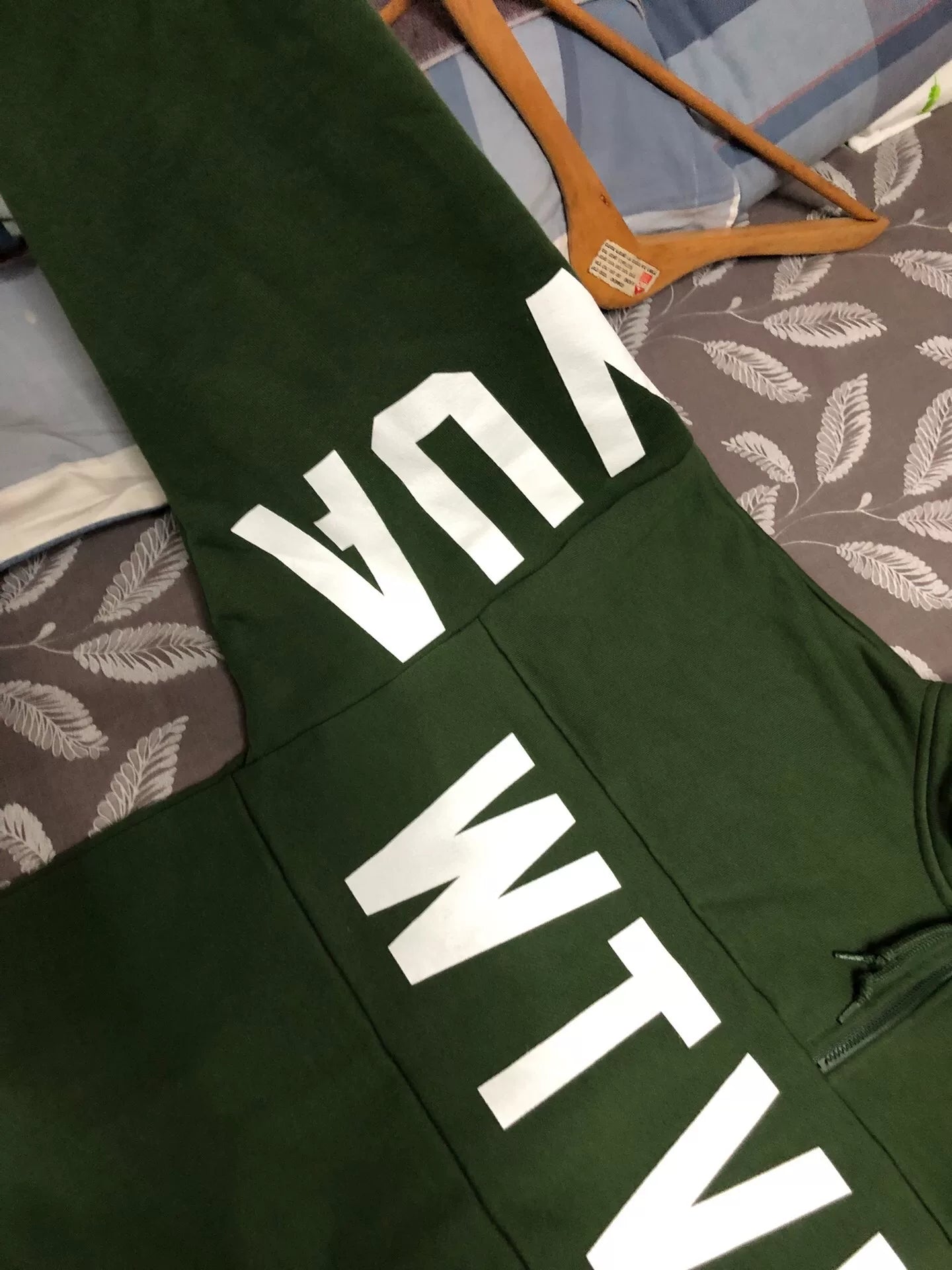 wtaps green pullover sweatshirt with text