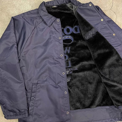 navy blue coach jacket with logo