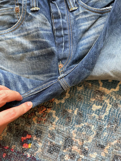 rrl distressed denim jeans with holes