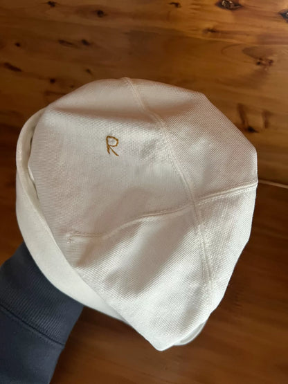 white knitted beanie with logo