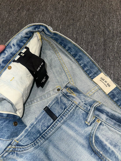 fear of god distressed denim pants