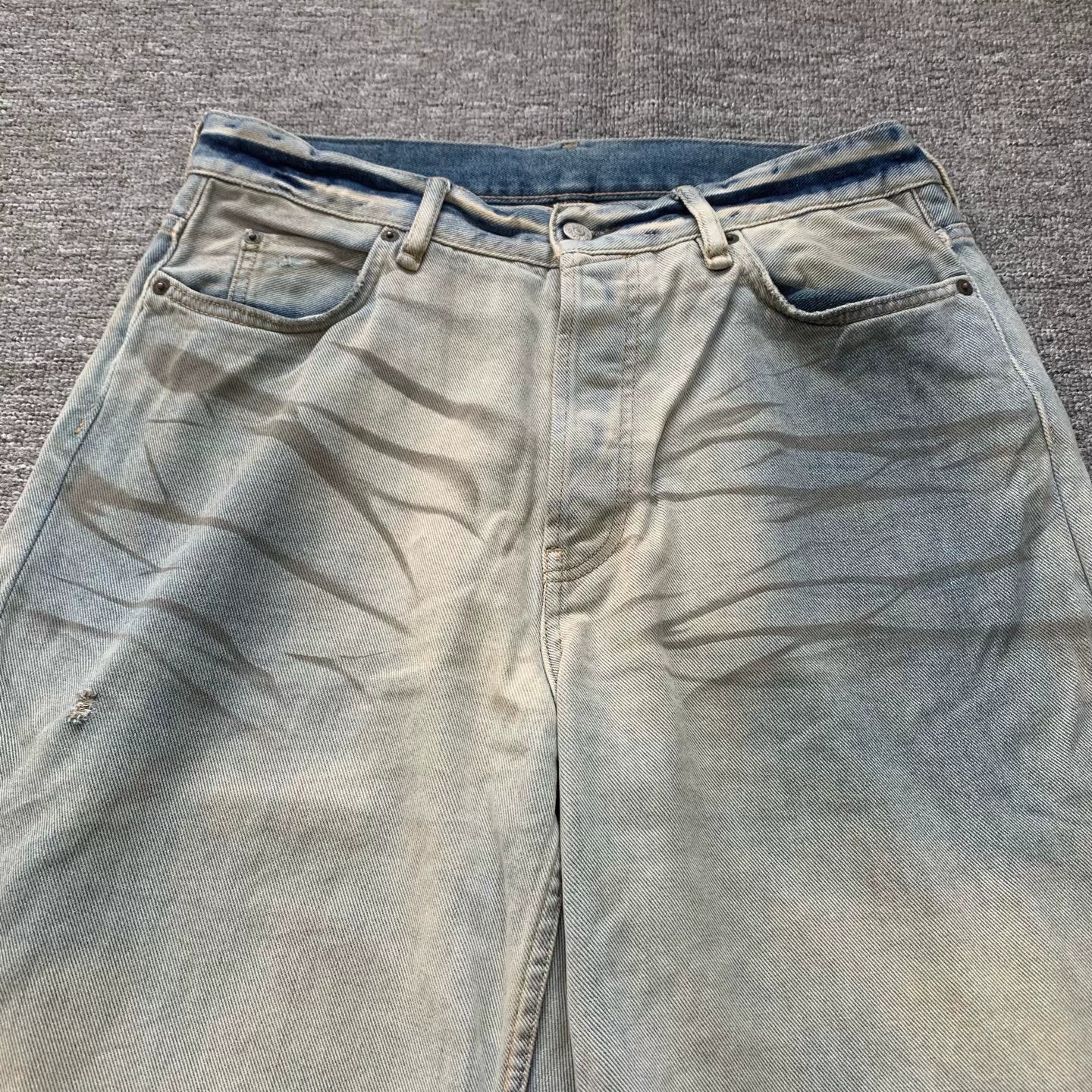 acne studios 1981m distressed denim trousers