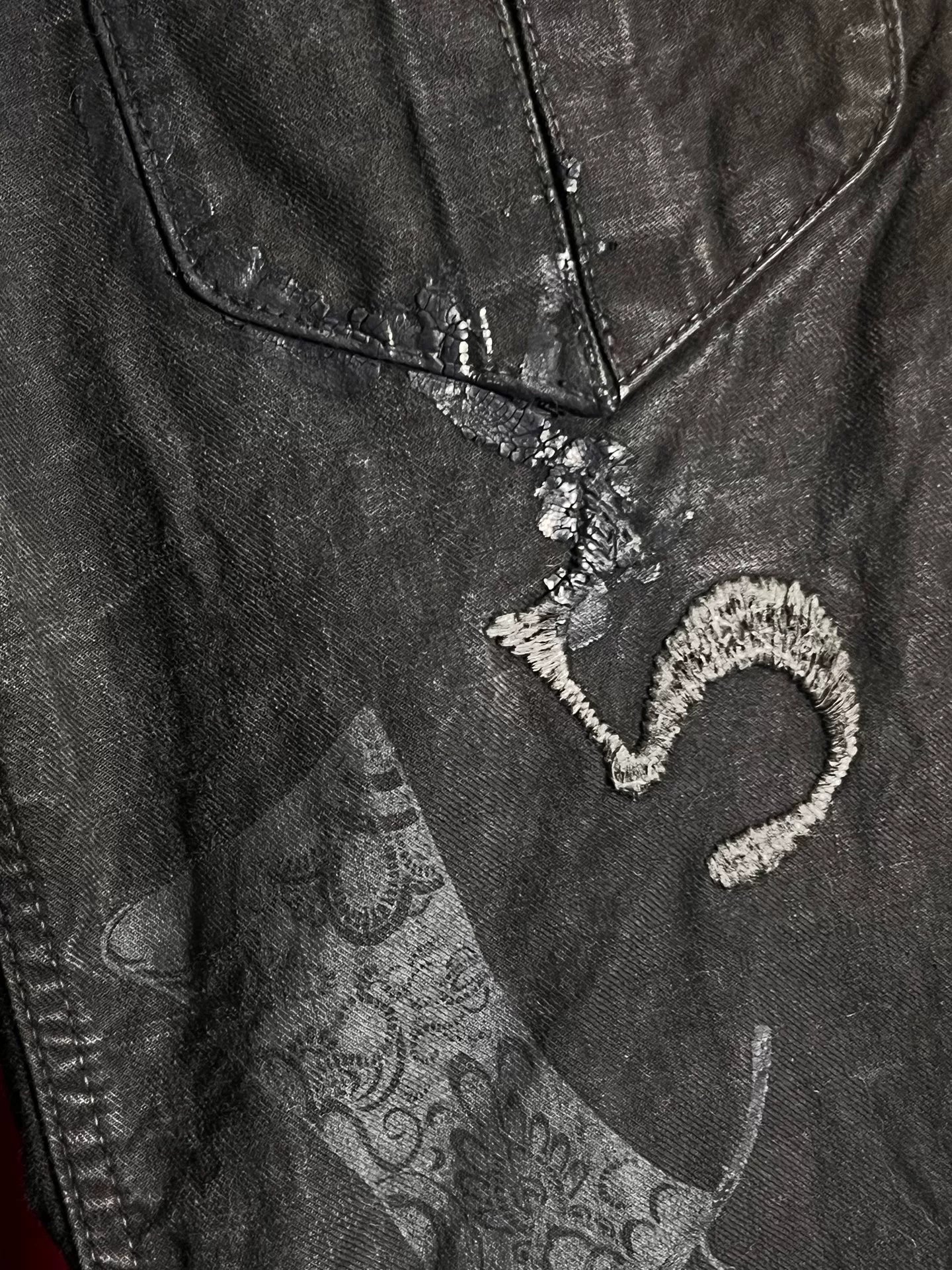 embroidered denim pants with patchwork details