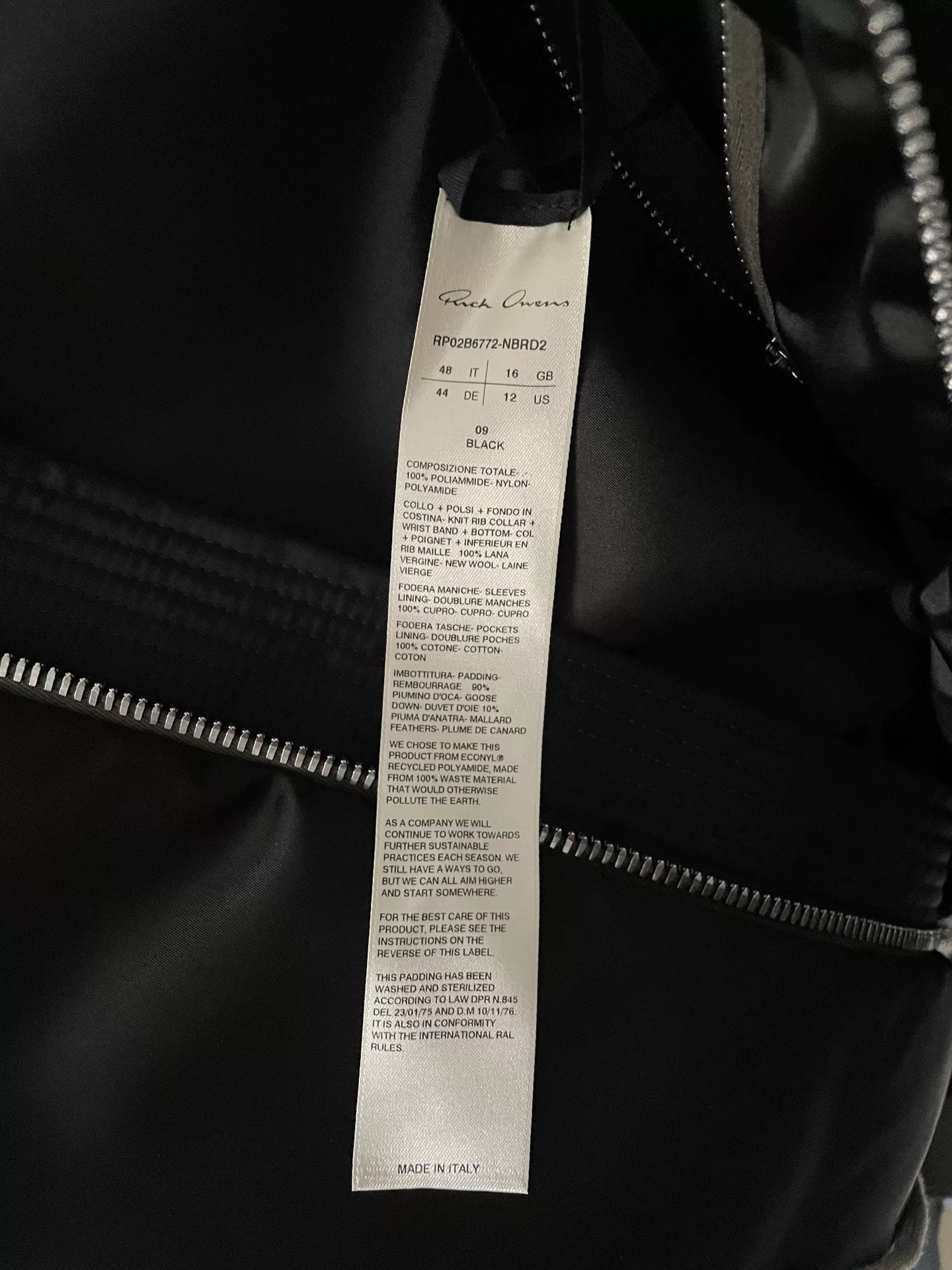 oversized black puffer jacket with waist tie