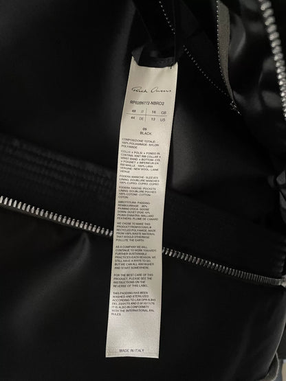 oversized black puffer jacket with waist tie