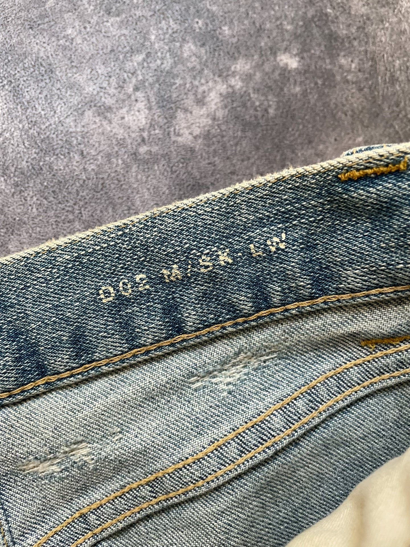 Saint Laurent Distressed Light Blue Jeans