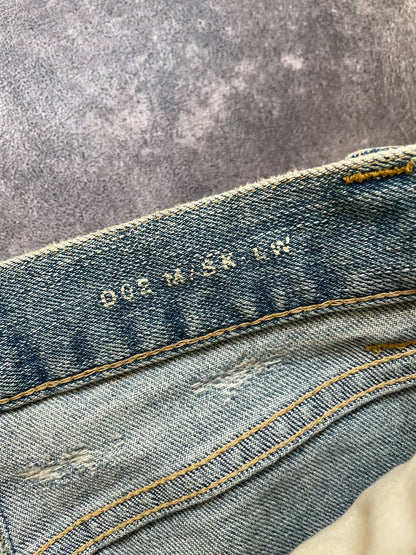 Saint Laurent Distressed Light Blue Jeans