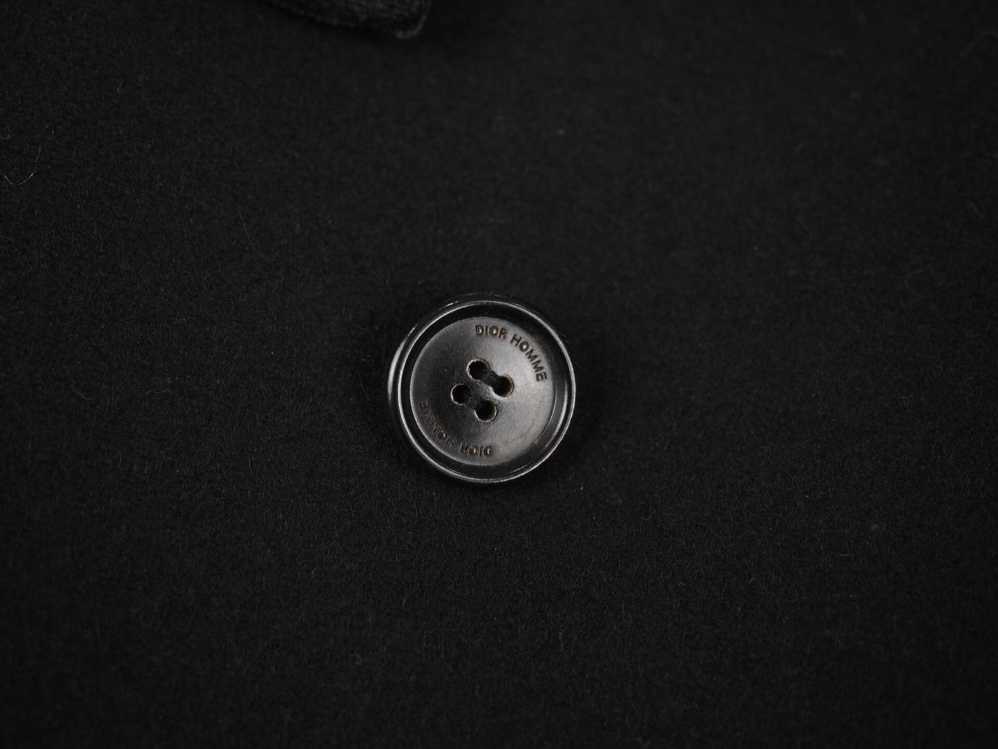 black wool blend coat with leather details